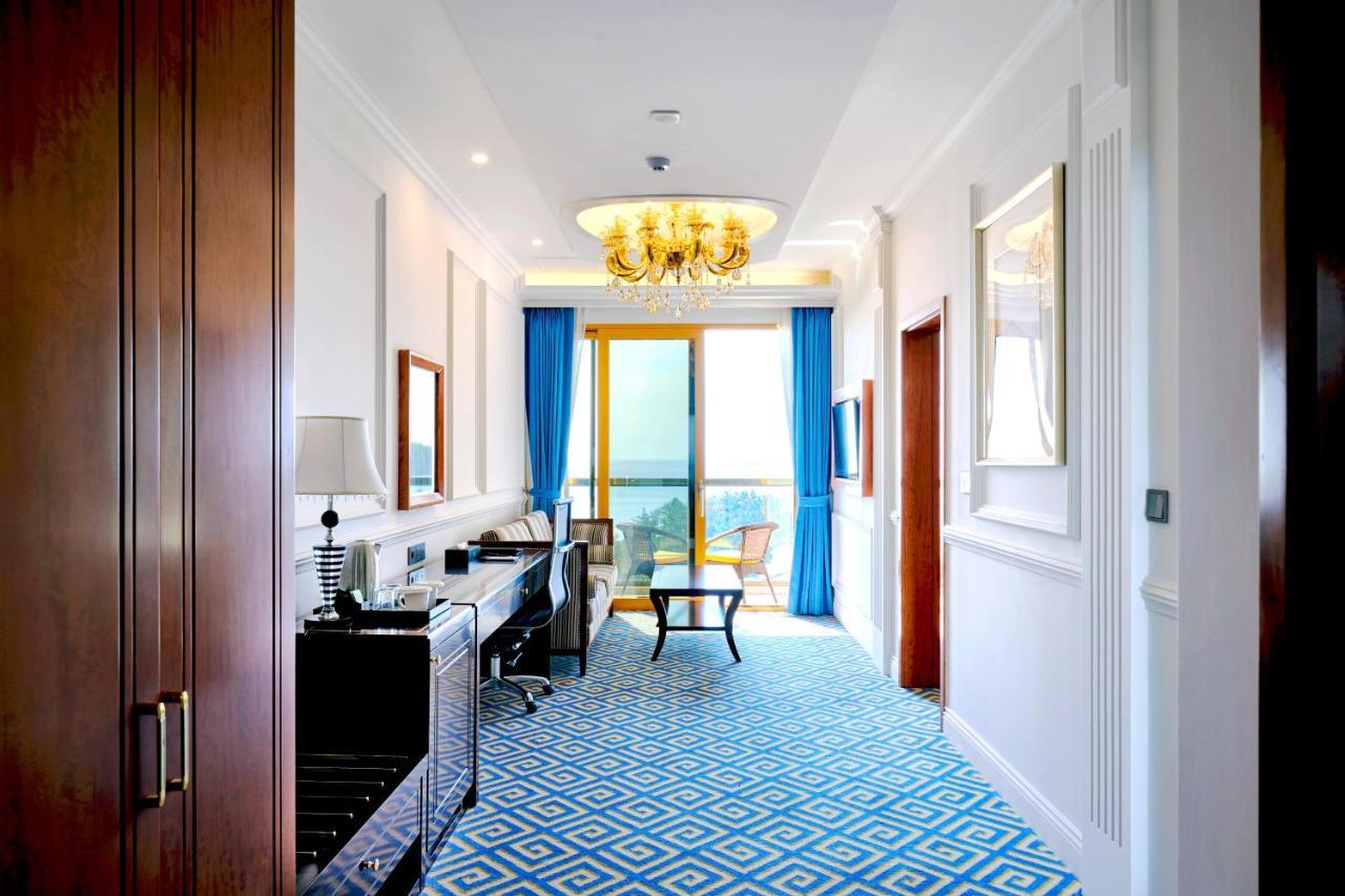 Goldone Hotel & Suites Сеогвипо Екстериор снимка