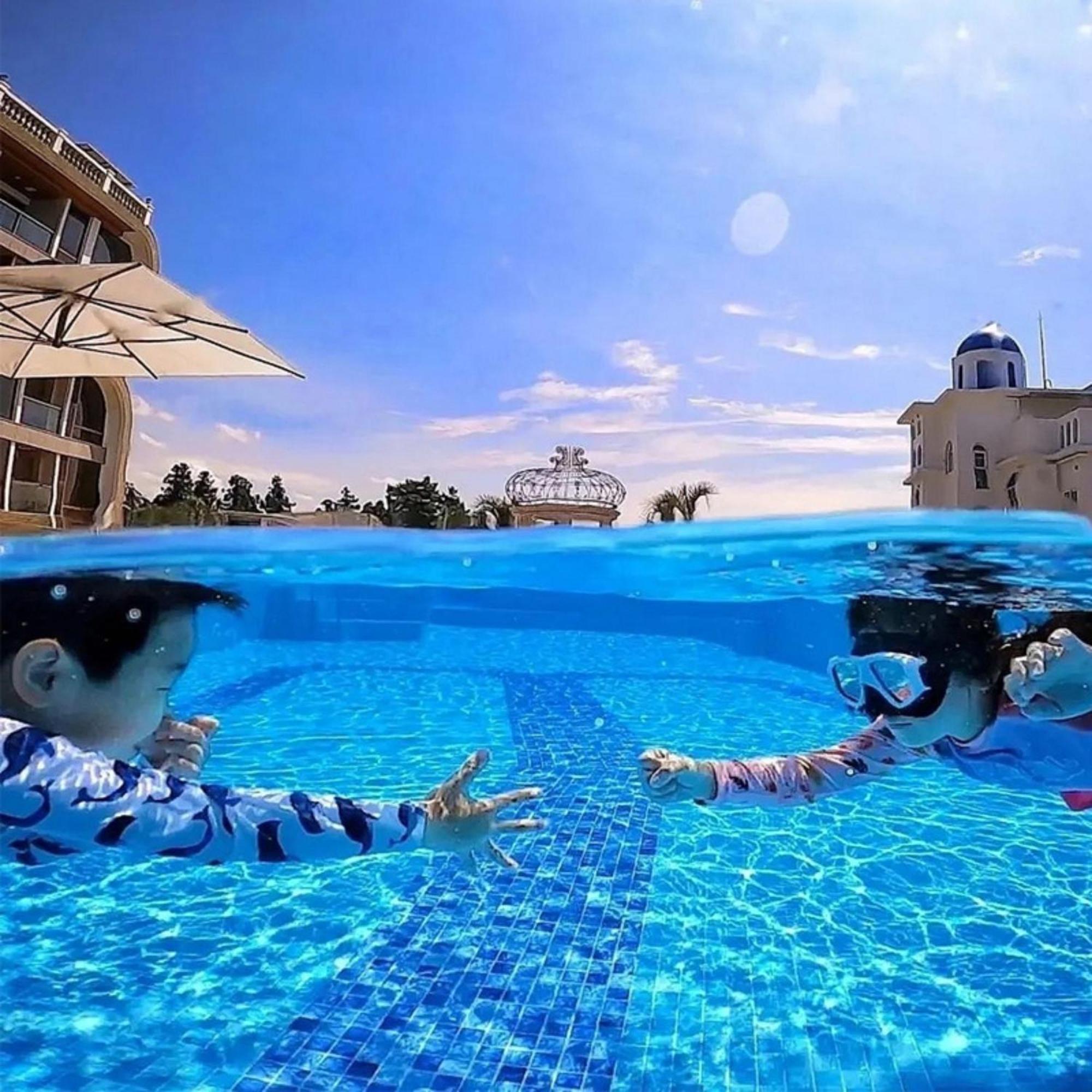 Goldone Hotel & Suites Сеогвипо Екстериор снимка