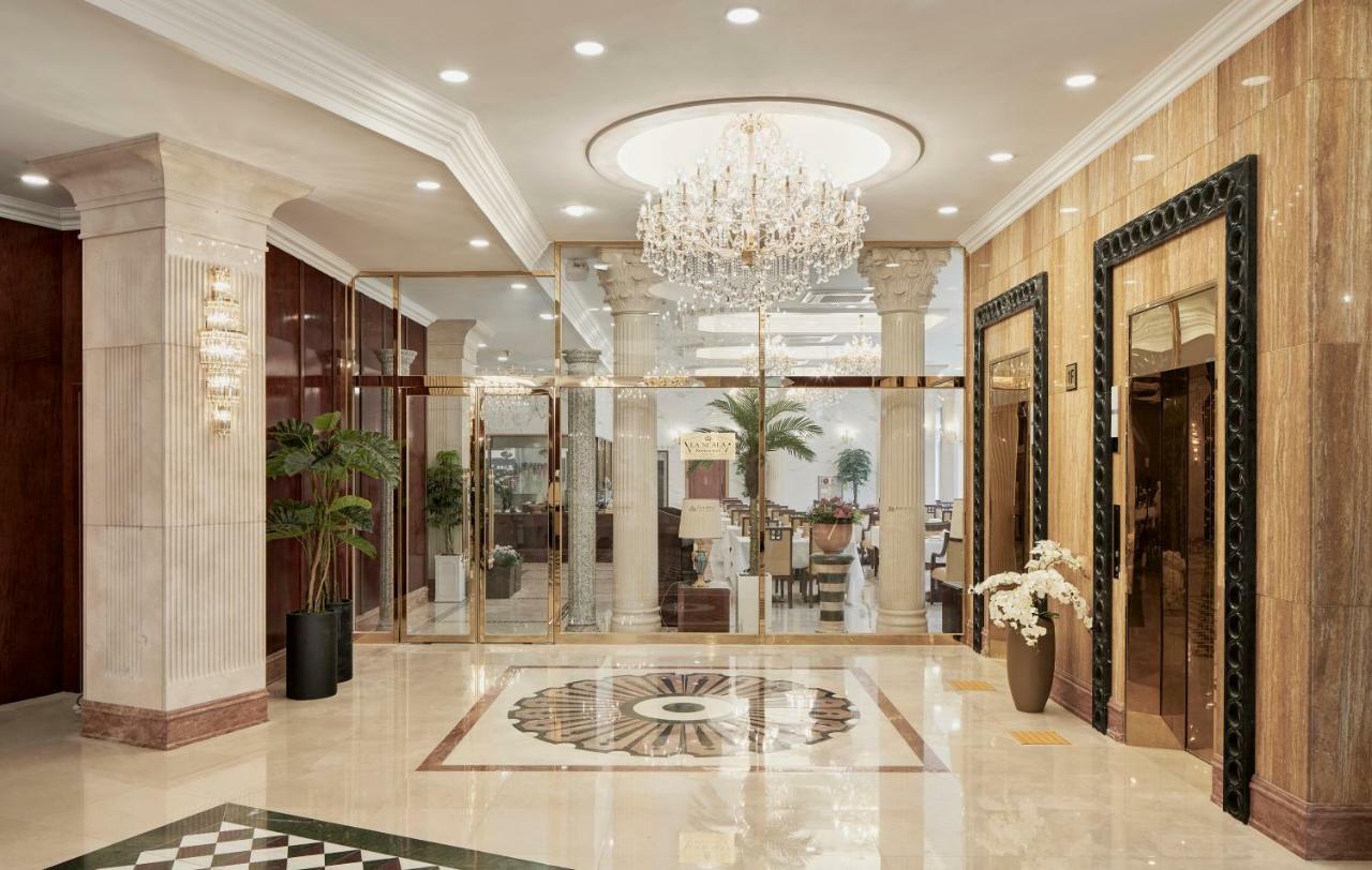 Goldone Hotel & Suites Сеогвипо Екстериор снимка